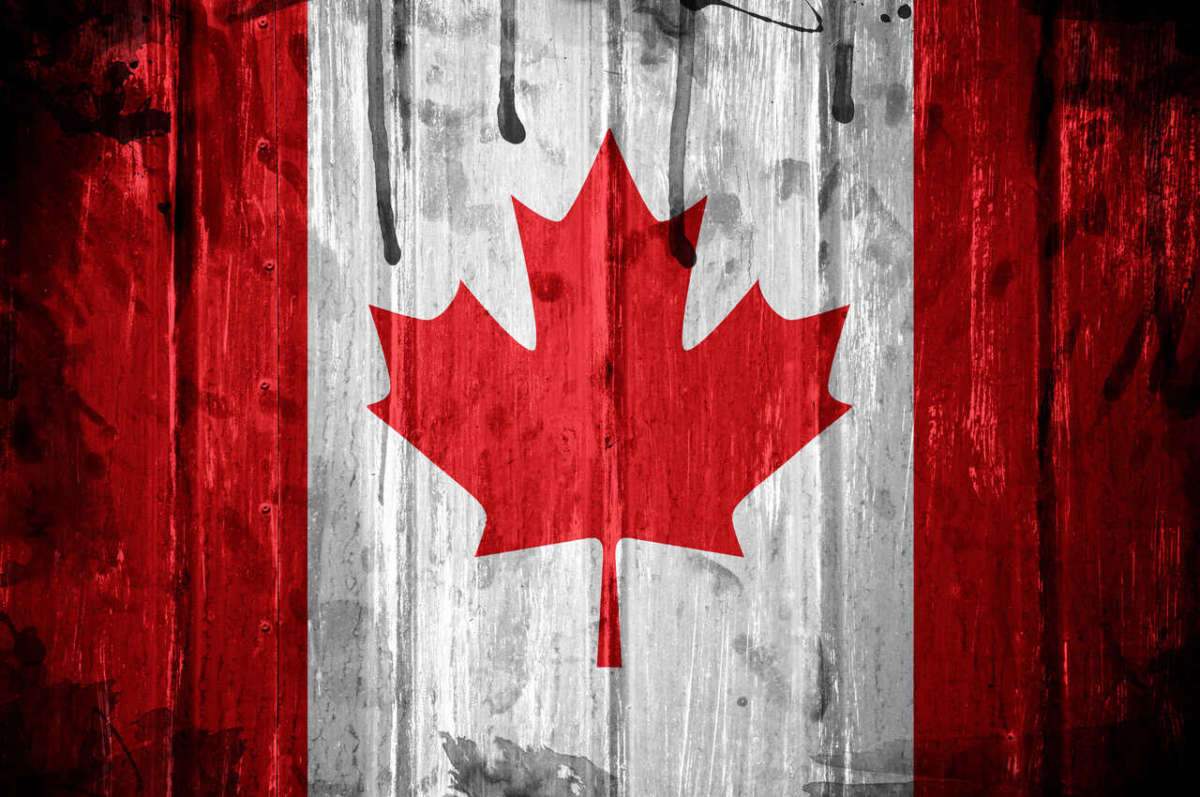 Canadian,flag,overlaid,with,grunge,texture