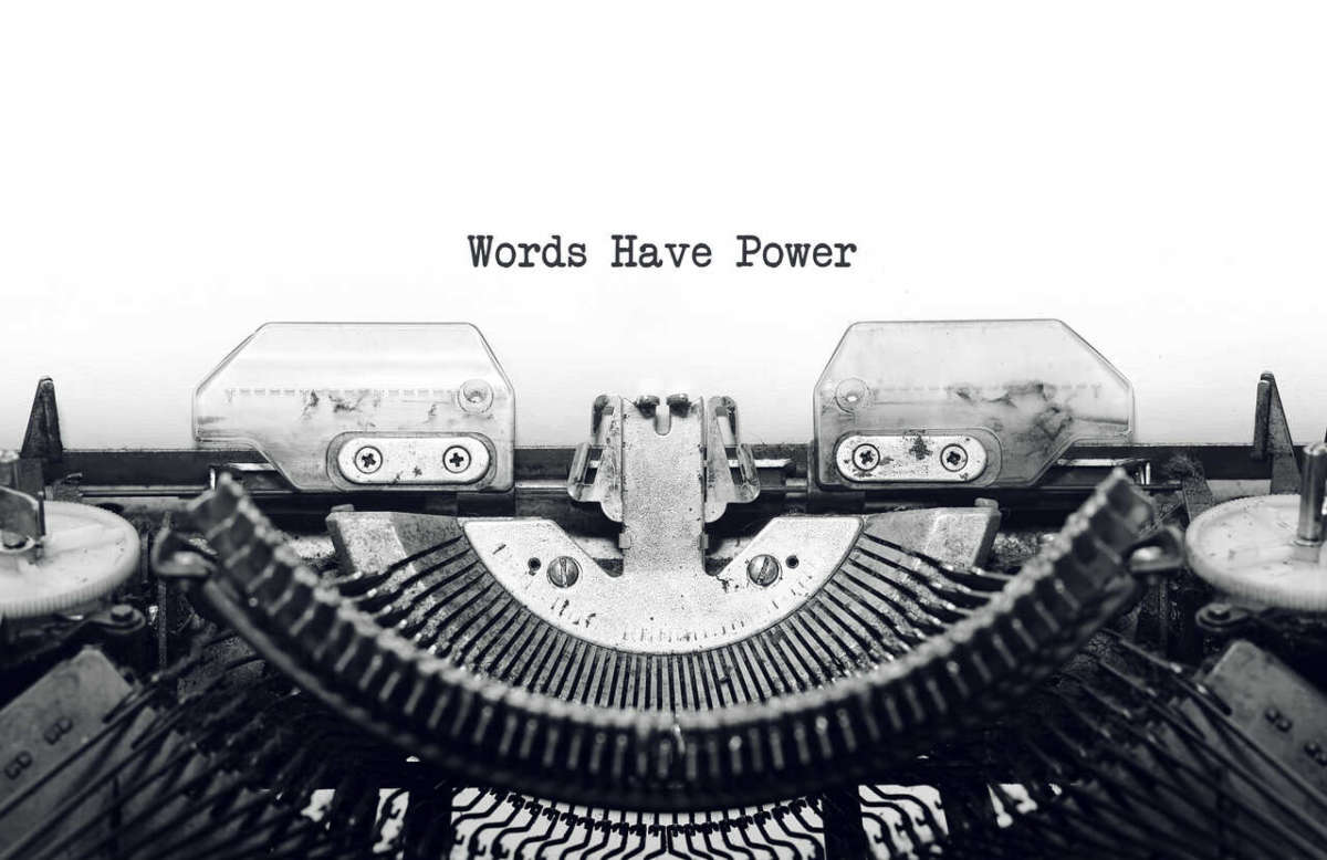 Vintage,typewriter,on,white,background,with,text,words,have,power.